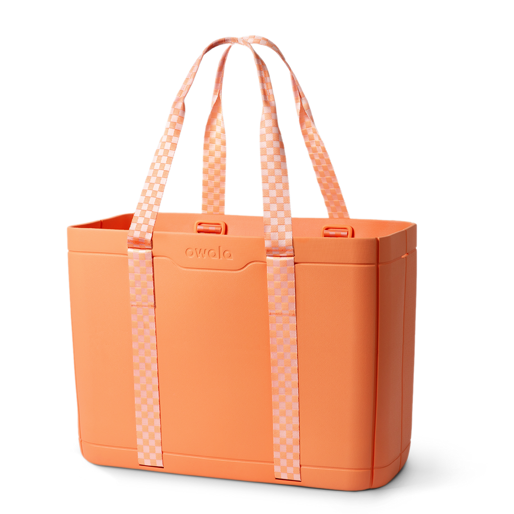 Sun-Day Collapsible Tote in Hot Tropic, solid coral orange tote bag with light pink checkerboard patterned carry loops and matching strap