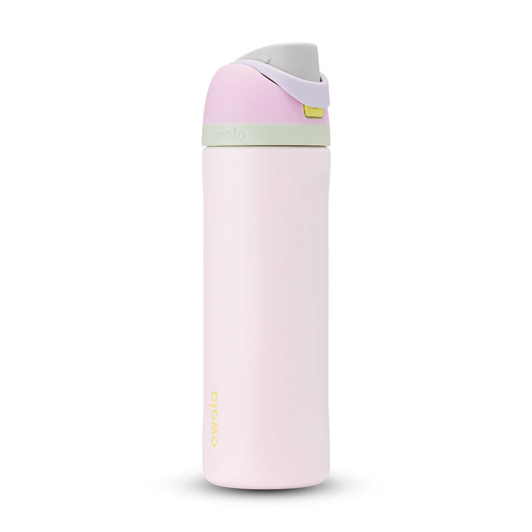 FreeSip 24oz water bottle, soft blush pink body with pale pink and sage green color-block flip cap