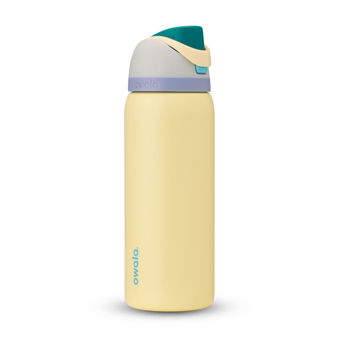 FreeSip 32oz water bottle, pale butter yellow body with teal, soft lavender, and tan color-block lid and flip cap