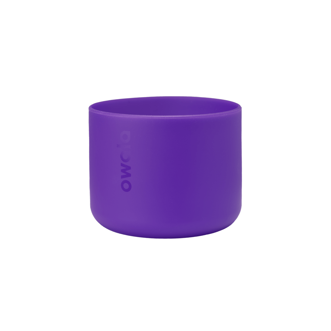 Bottle Boot 32oz in bright purple silicone; medium cylindrical form with Owala wordmark