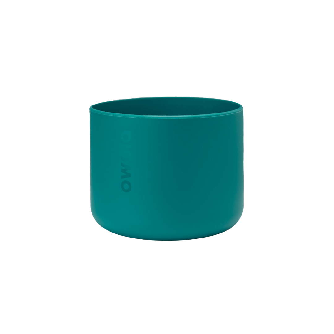 Bottle Boot 32oz in teal green silicone; medium cylindrical form with Owala wordmark