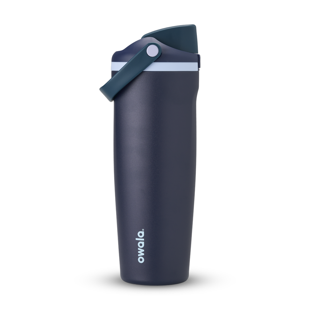 FreeSip Sway 32oz in Sea Captain, deep navy blue insulated water bottle with teal flip cap, navy carry loop and pale blue accent, lid open