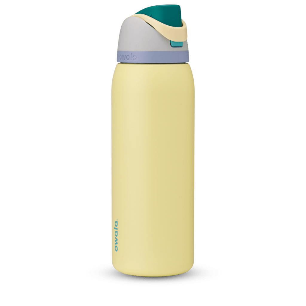 FreeSip 40oz in Sunny Daze, soft yellow body with teal flip cap, cream carry loop, gray lid, and lavender accent band