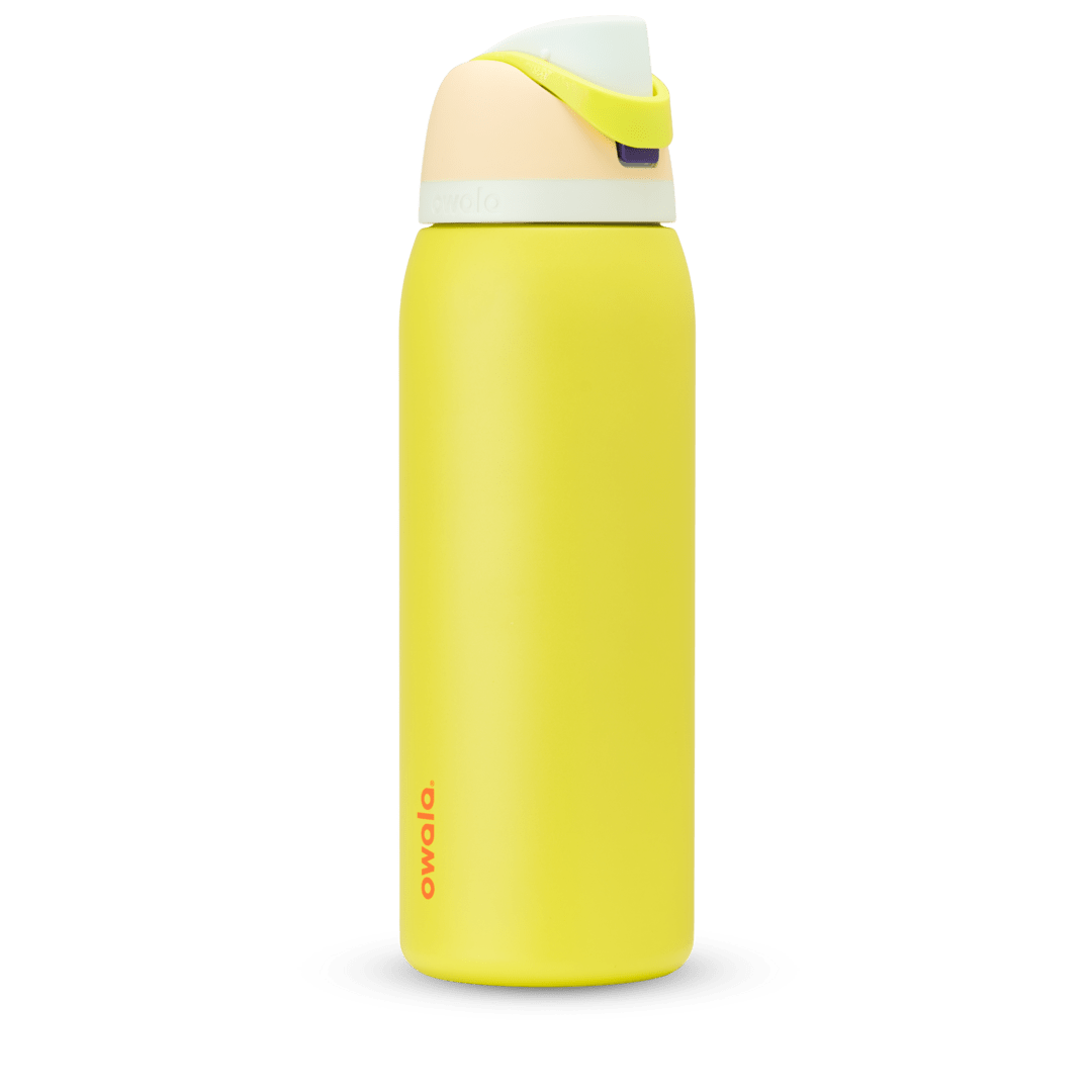 FreeSip 40oz water bottle, bright yellow body with pale cream and peach color-block flip cap