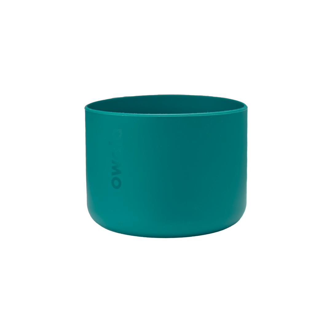 Bottle Boot 40oz in teal green silicone; wide cylindrical form with Owala wordmark