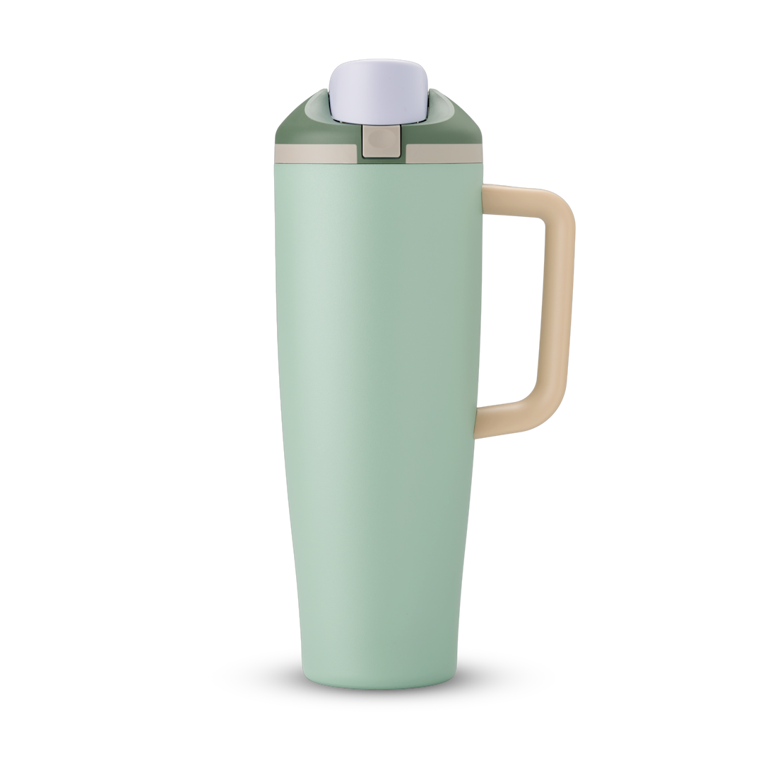 FreeSip Tumbler 40oz in Eucalyptus — soft sage green body with matching lid and beige handle, viewed from the handle side