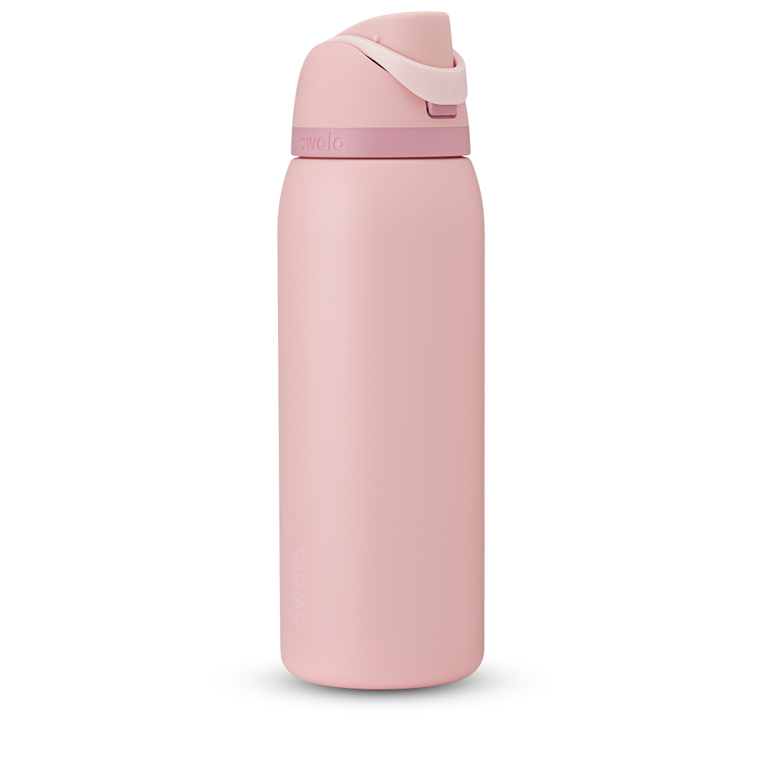 FreeSip 40oz water bottle, soft blush pink body with matching pink flip cap and carry loop