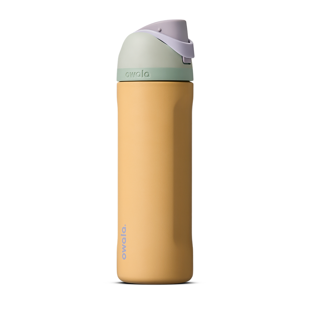 FreeSip 24oz in Beachfront, warm golden yellow insulated bottle with mint green accent band, lavender flip cap, and lavender carry loop