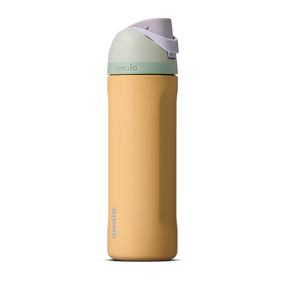 FreeSip 24oz in Beachfront, warm golden yellow insulated bottle with mint green accent band, lavender flip cap, and lavender carry loop