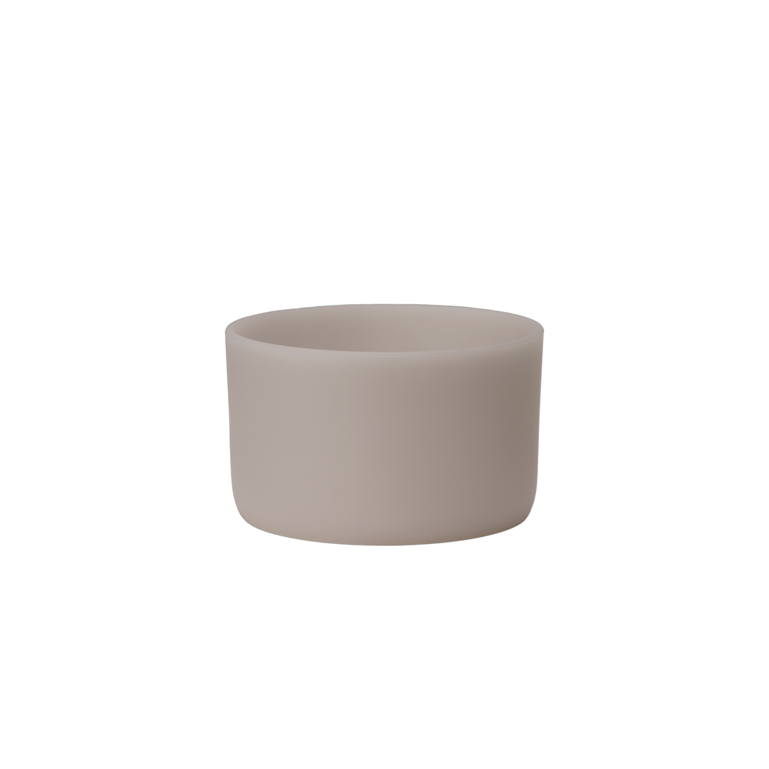 Owala Bottle Boot in translucent matte warm gray silicone, wide short cylindrical form for FreeSip Tumbler and Sway bottles