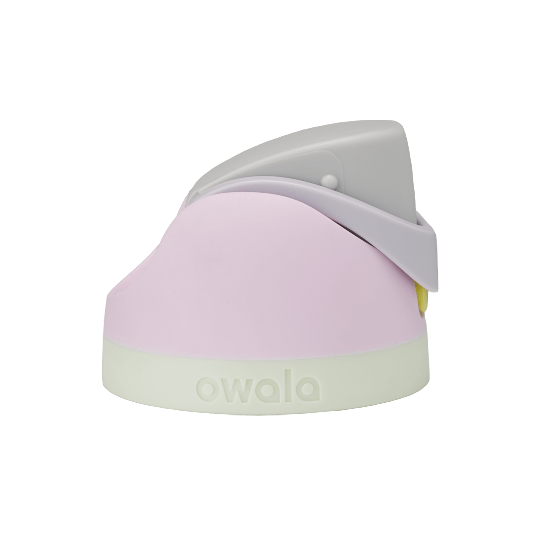 Owala FreeSip replacement lid in Candy Coated, light pink body with light gray flip cap, lavender carry loop, and cream white base accent band
