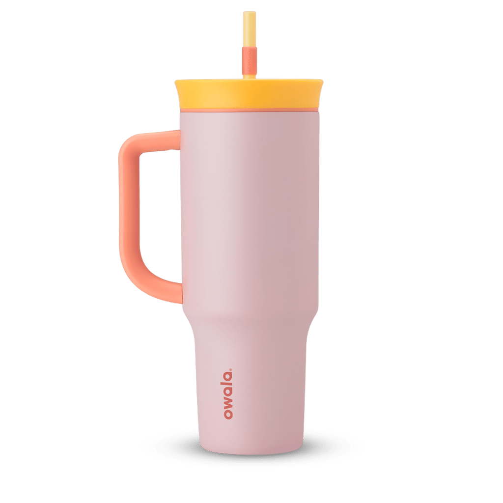 40oz Tumbler in Candy Store, soft blush pink insulated tumbler with coral handle, golden yellow lid, and pale yellow straw with coral grip