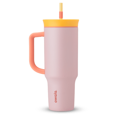 40oz Tumbler in Candy Store, soft blush pink insulated tumbler with coral handle, golden yellow lid, and pale yellow straw with coral grip