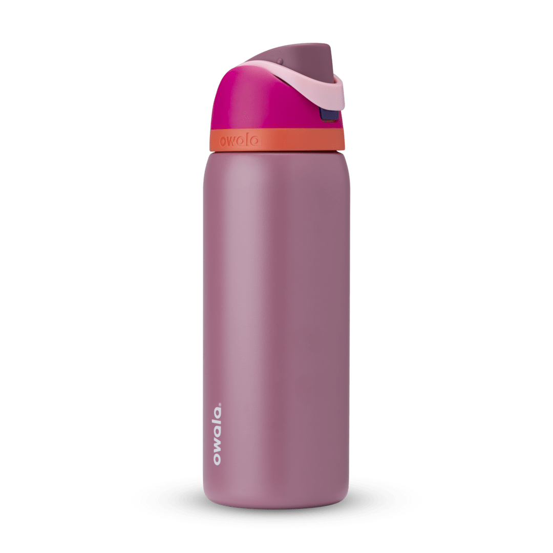 FreeSip 32oz in Crown Jewel, dusty mauve body with hot pink flip cap, light pink carry loop, and bright orange accent band