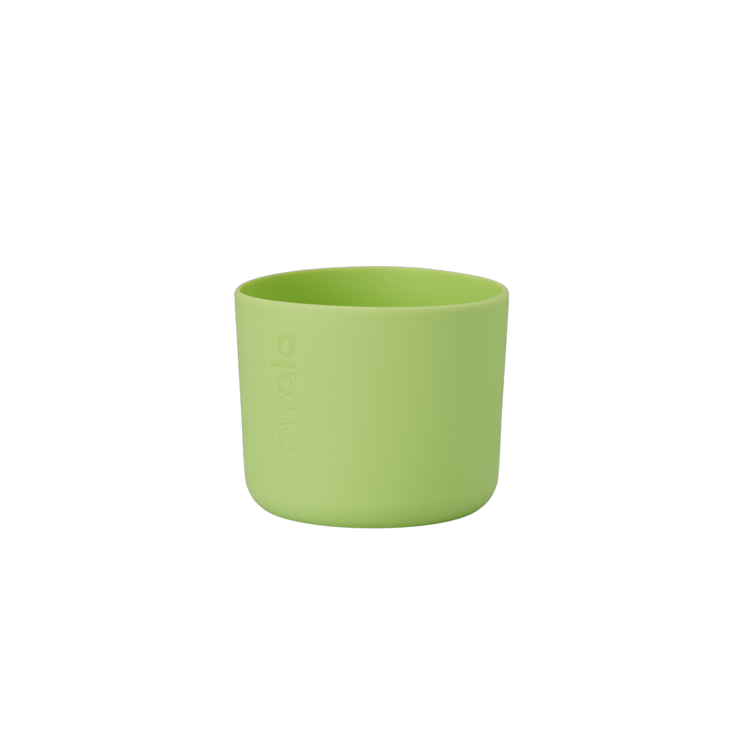 Owala Bottle Boot in bright lime green silicone with tonal Owala logo, short cylindrical form sized for 16oz Kids' FreeSip bottles