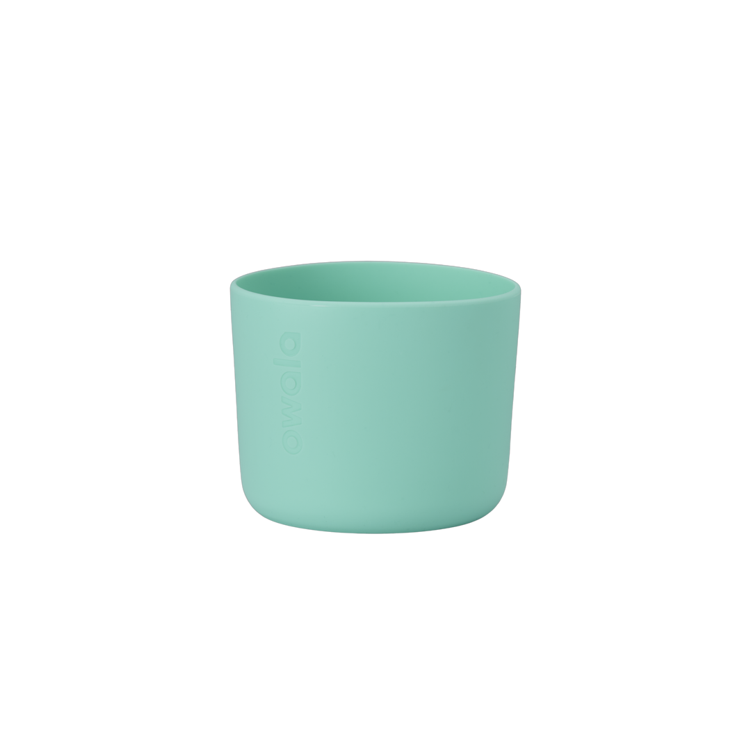 Owala Bottle Boot in bright mint teal silicone with tonal Owala logo, short cylindrical form sized for 16oz Kids' FreeSip bottles