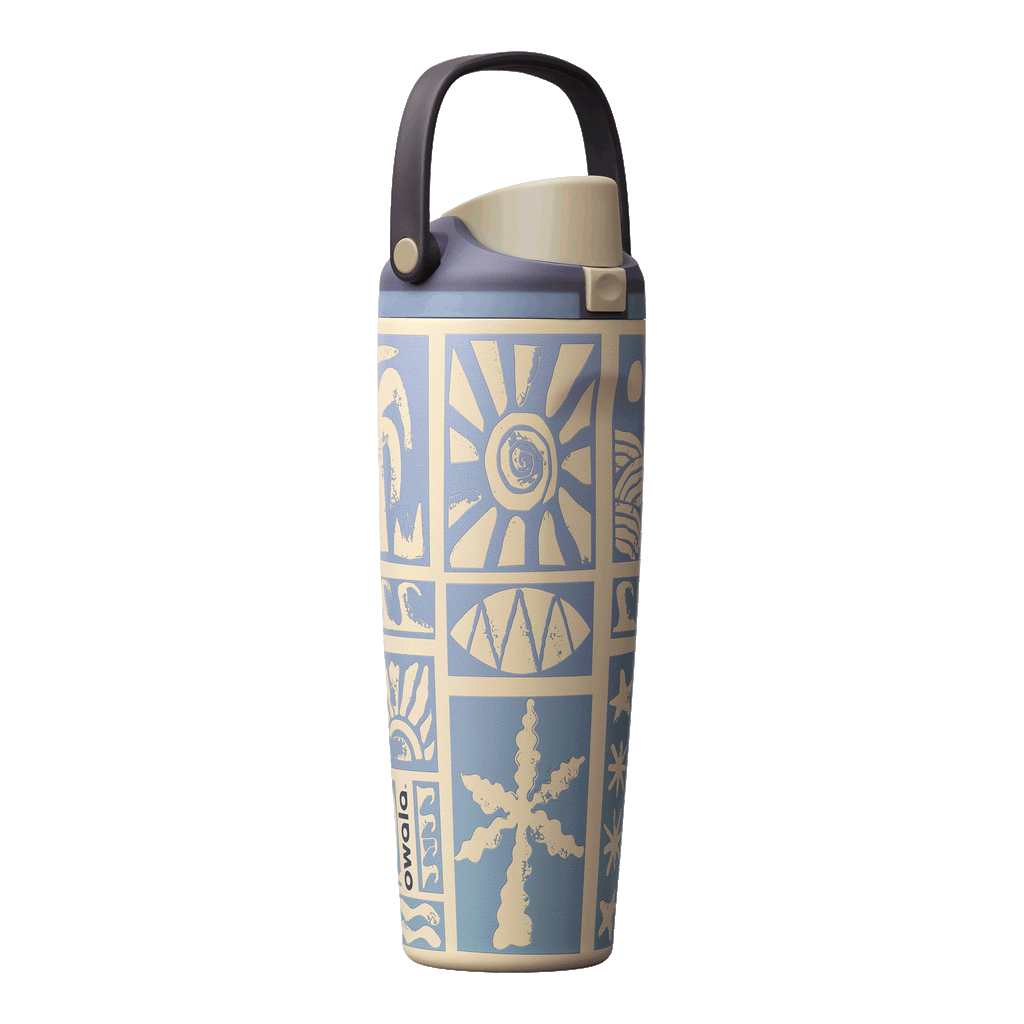 Owala Birthday Bash 40oz FreeSip Sway Vintage Surf; cornflower blue and cream body with bold retro sun, diamond, and geometric tile block-print pattern, cream flip cap and leather carry loop
