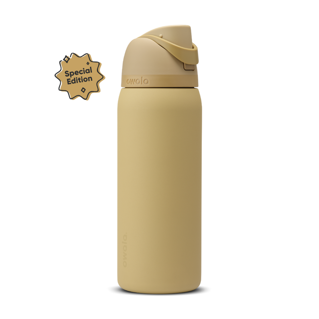 FreeSip 32oz Autumn Vista; warm golden sand body with matching tan flip cap, lighter cream-tan carry loop, and tan lid