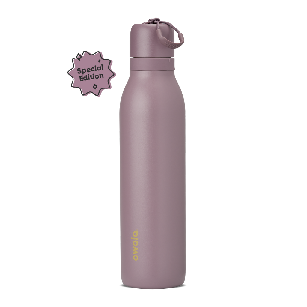 FreeSip Twist 24oz in Spring Revival, dusty mauve-purple insulated bottle with matching twist cap and carry string, gold Owala logo