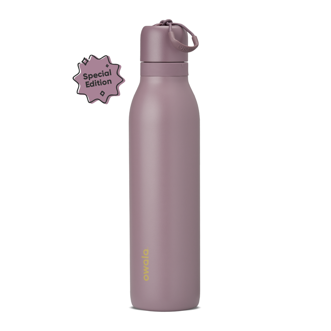 FreeSip Twist 24oz in Spring Revival, dusty mauve-purple insulated bottle with matching twist cap and carry string, gold Owala logo