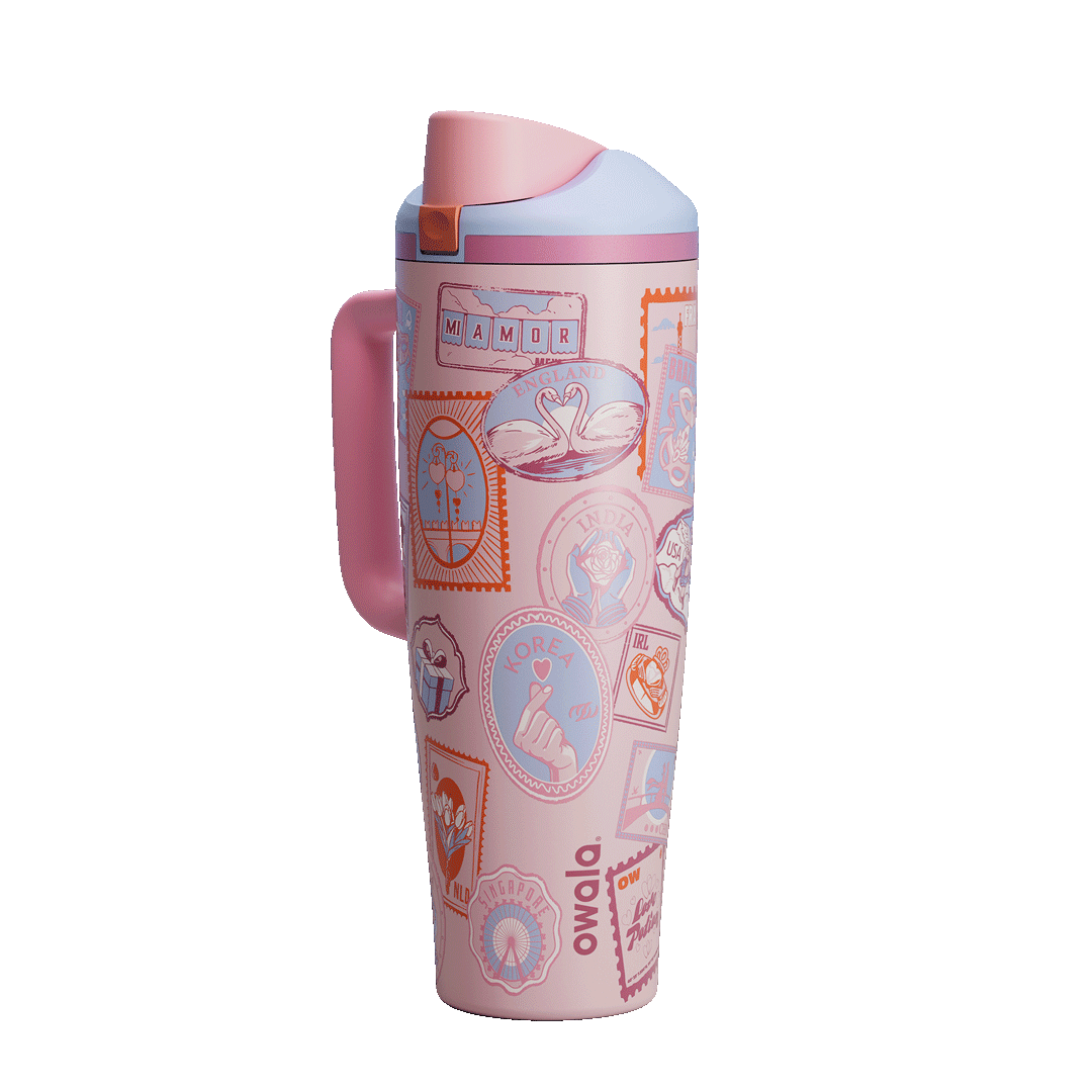 FreeSip Tumbler 40oz Sending Love; rotating view of blush pink handled tumbler with pastel illustrated stamp patches and pink flip cap