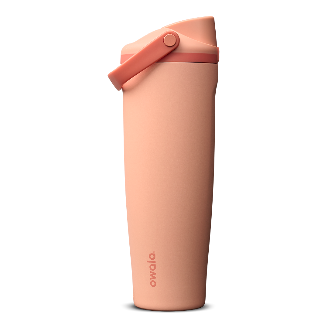 FreeSip Sway 40oz in Peach of Mind, soft peachy-salmon insulated water bottle with coral flip cap and carry loop