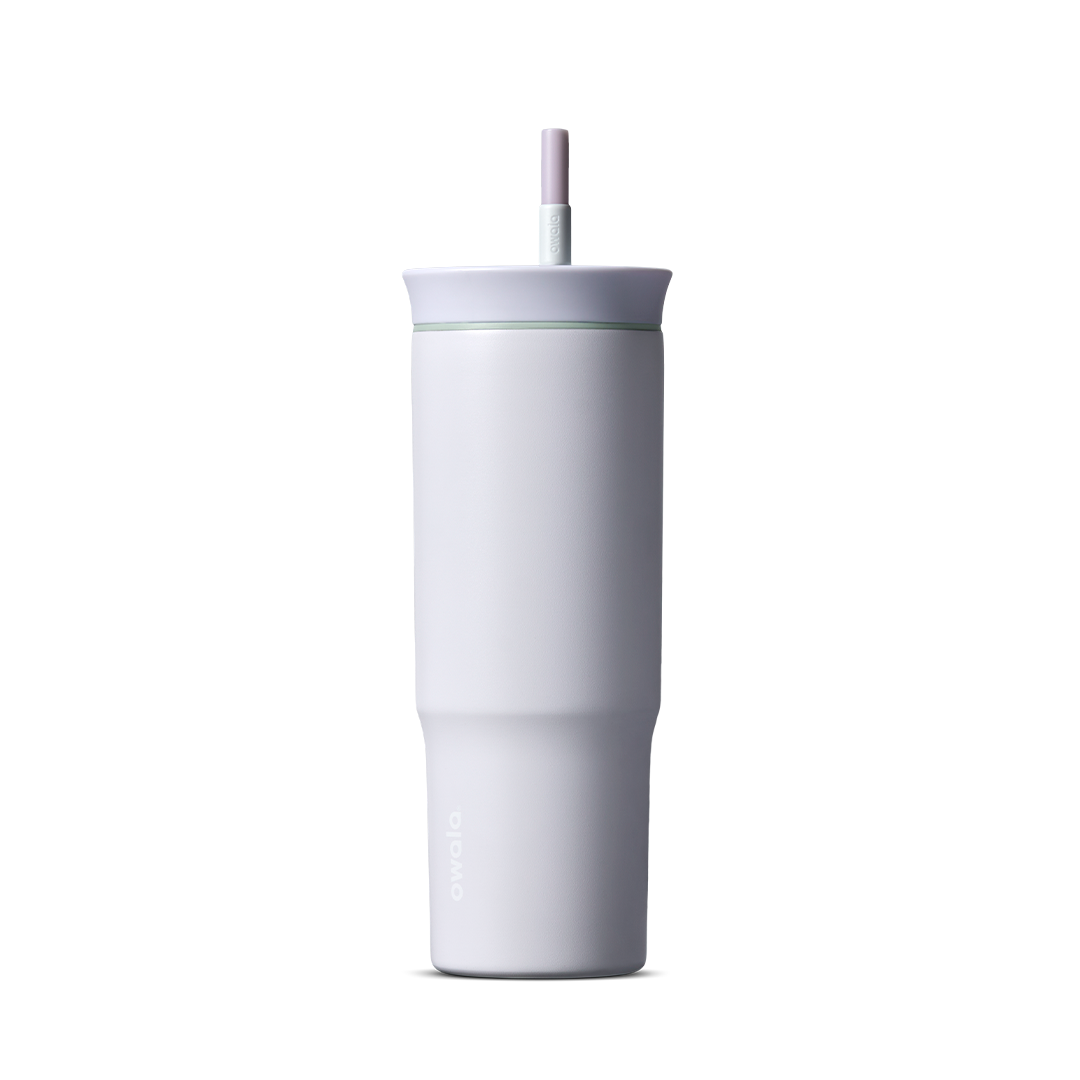 24oz Tumbler in Open Air; matte off-white insulated tumbler with white lid and pink-striped straw, Owala wordmark on front