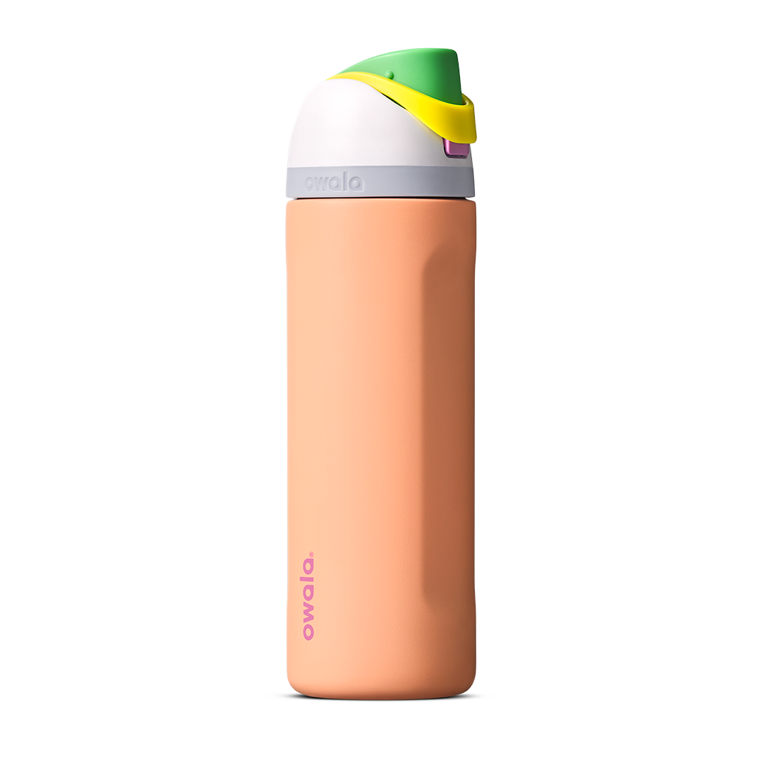 FreeSip 24oz in Peachy Keen, soft peach orange insulated bottle with white flip cap lid, yellow flip tab, and bright green carry loop