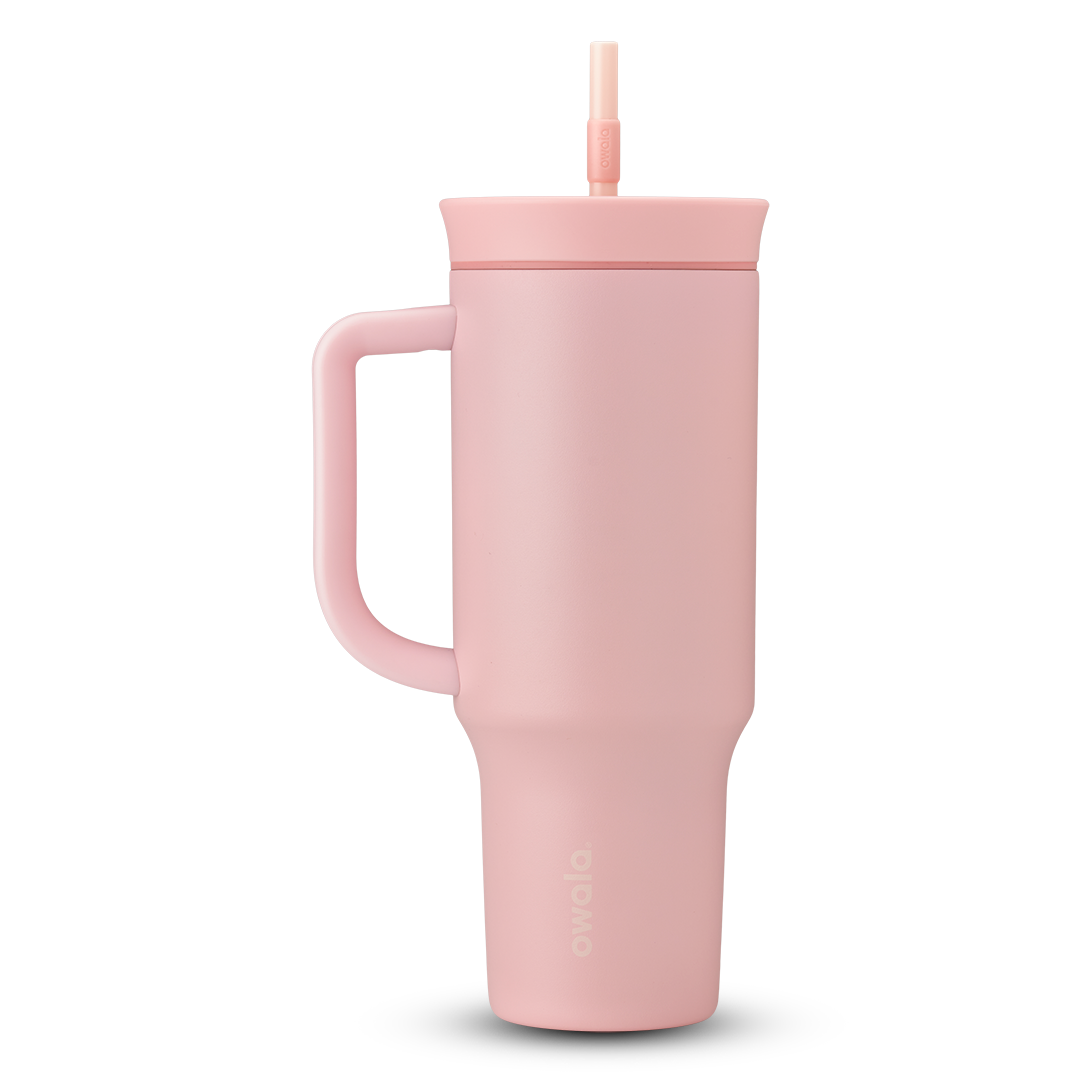 40oz Tumbler in Rose Quartz, soft blush pink insulated tumbler with matching pink handle and lid, and pale pink straw