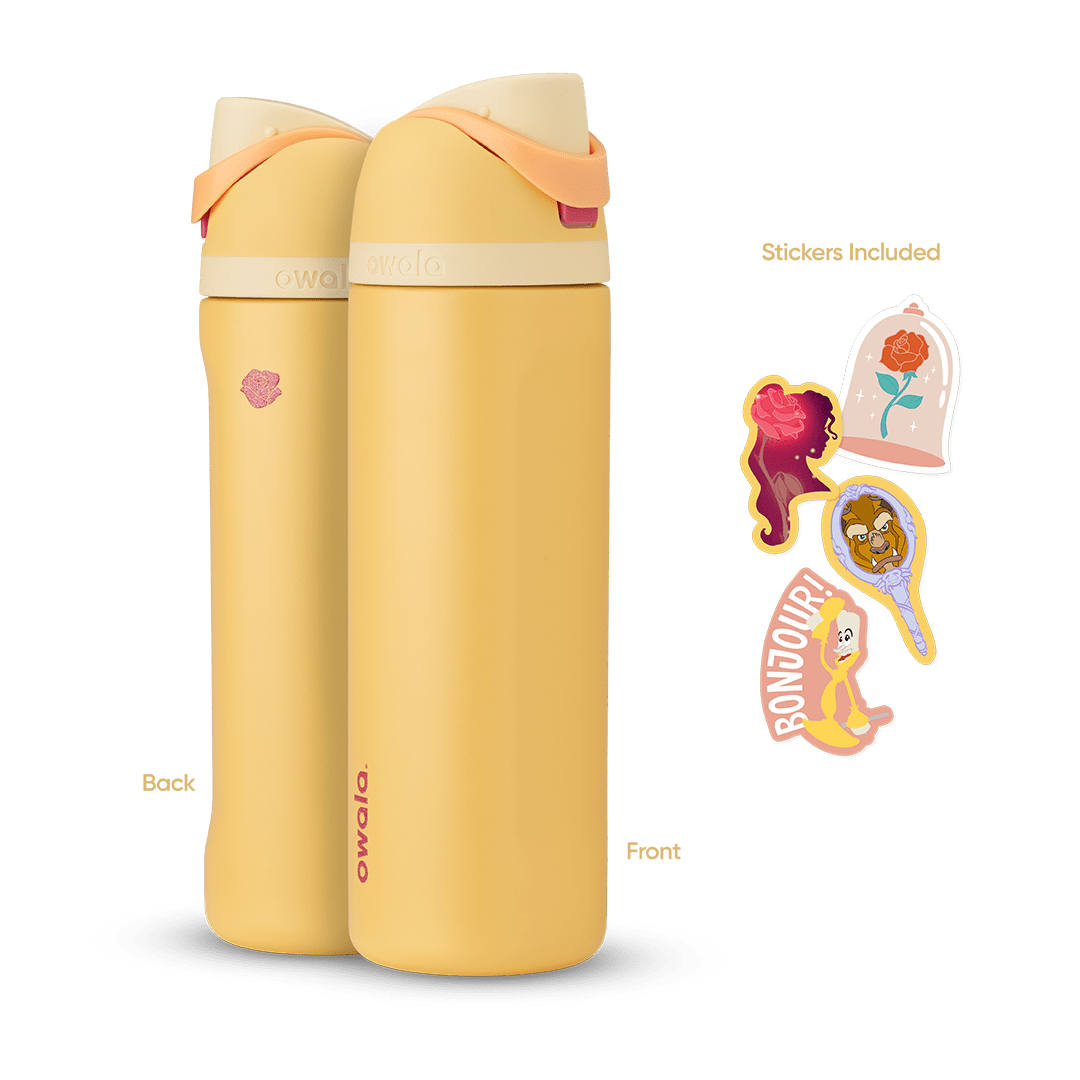 FreeSip 24oz in Belle, warm golden yellow insulated bottle with cream flip cap, cream lid, and peach orange carry loop, shown front and back with included enchanted rose, Belle silhouette, Beast hand mirror, and "Bonjour!" Lumière stickers