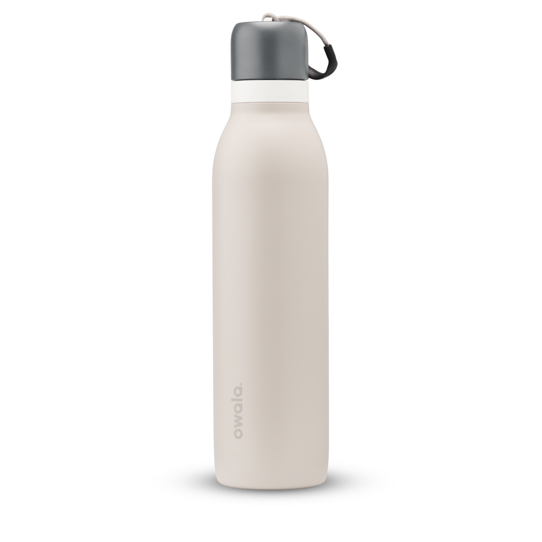 FreeSip Twist UK 24oz, off-white cream insulated water bottle with gray twist cap and carry loop