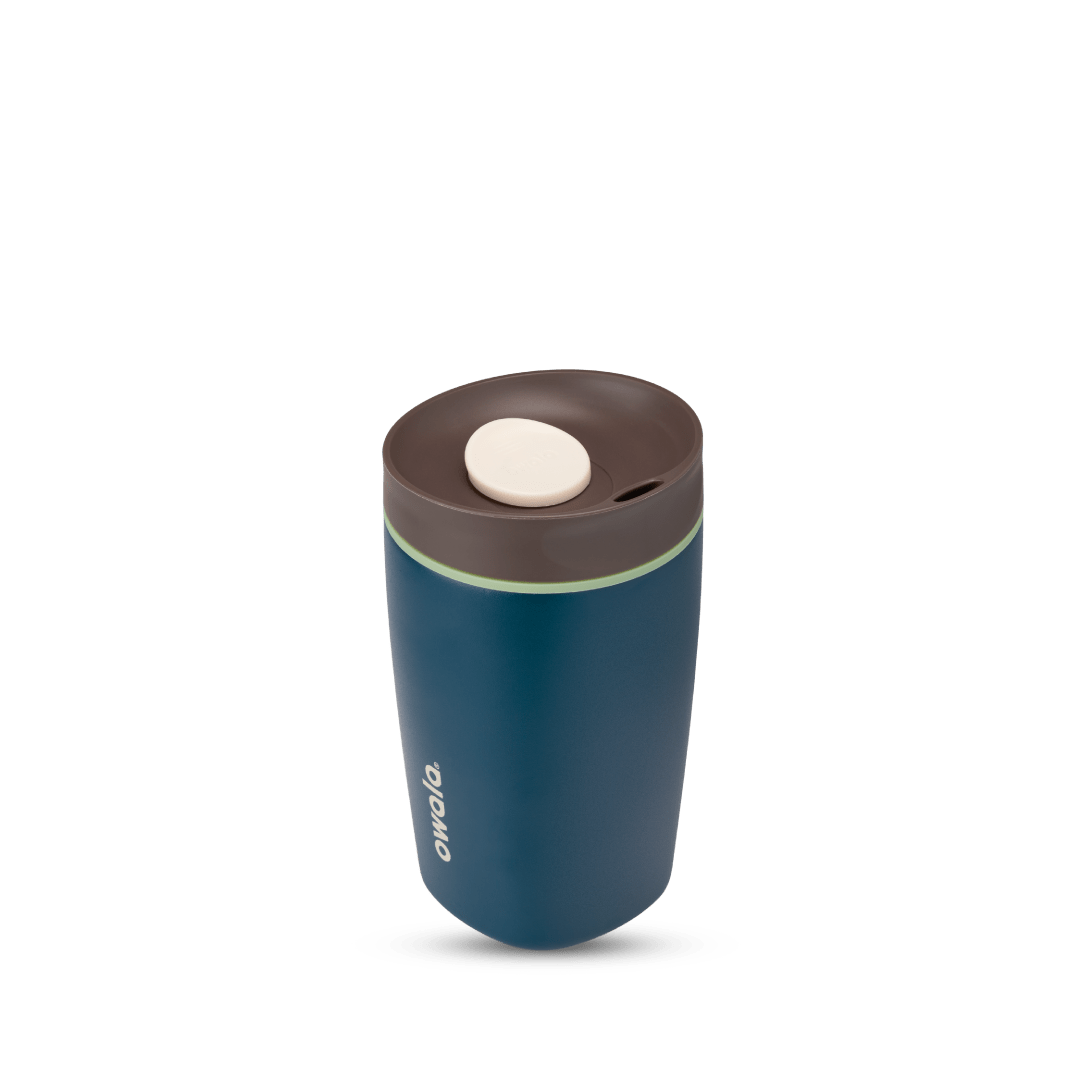 SmoothSip Slider 12oz in Moonlit Shadow, deep navy blue body with dark brown lid, cream slider button, and mint green accent ring