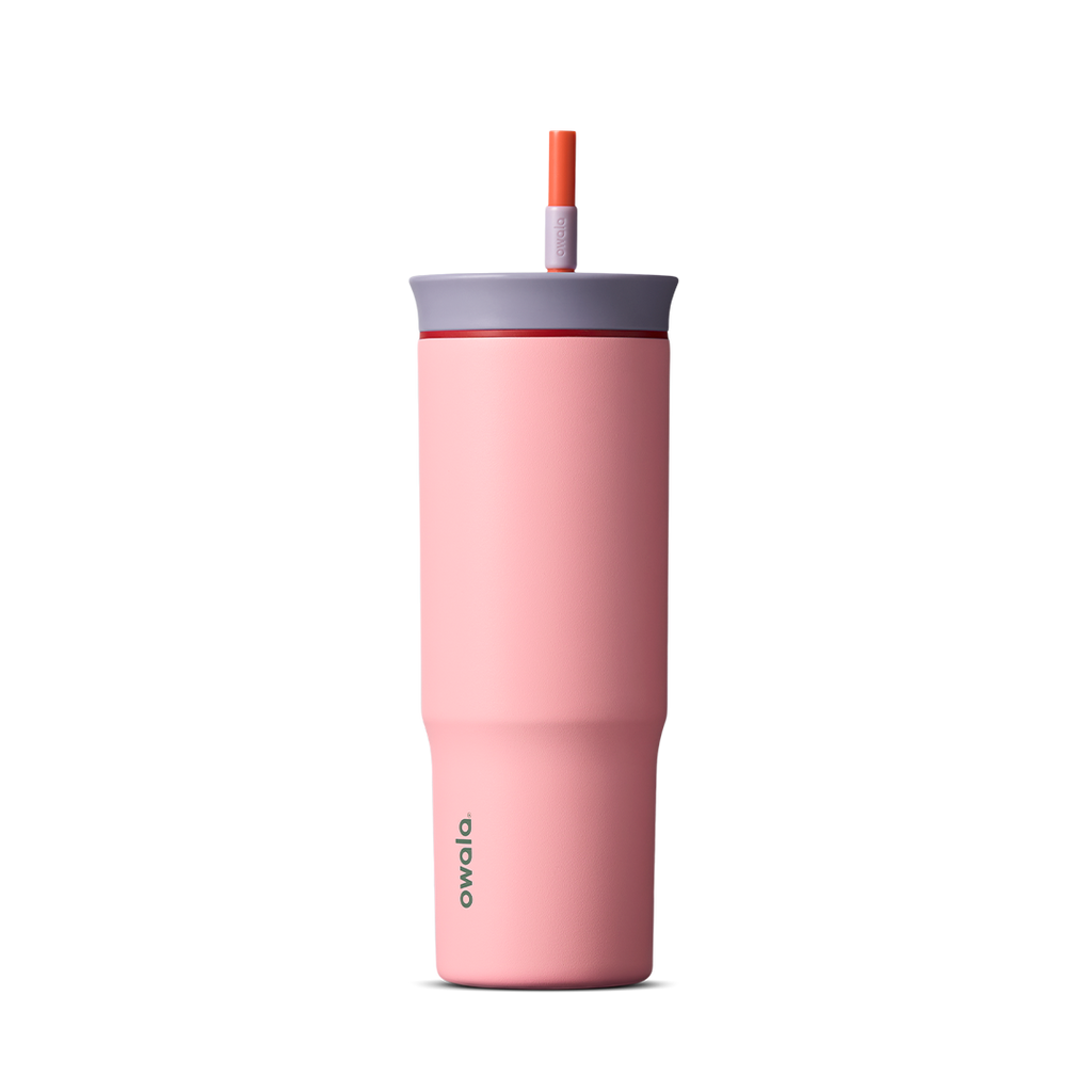 24oz Tumbler in Sugar High; matte coral-pink insulated tumbler with lavender-gray lid and orange-red straw, Owala wordmark on front