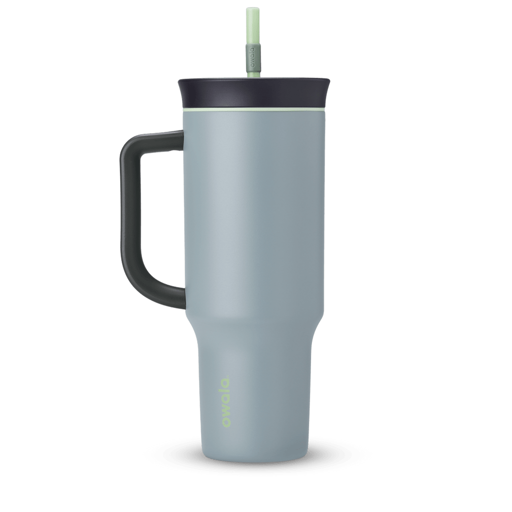 40oz Tumbler in Lost Valley, dusty blue-grey insulated tumbler with black handle, black lid with sage green accent ring, and pale green straw