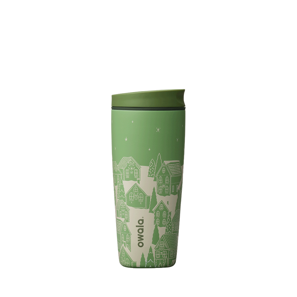 SmoothSip Slider 20oz in Gingerbread, light yellow-green body with dark green accent band, white print of gingerbread houses and trees on a snowy landscape under a starry sky